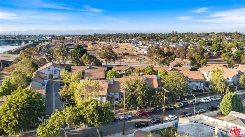 Welcome to this spacious two-story townhome-style condo in the - photo 15