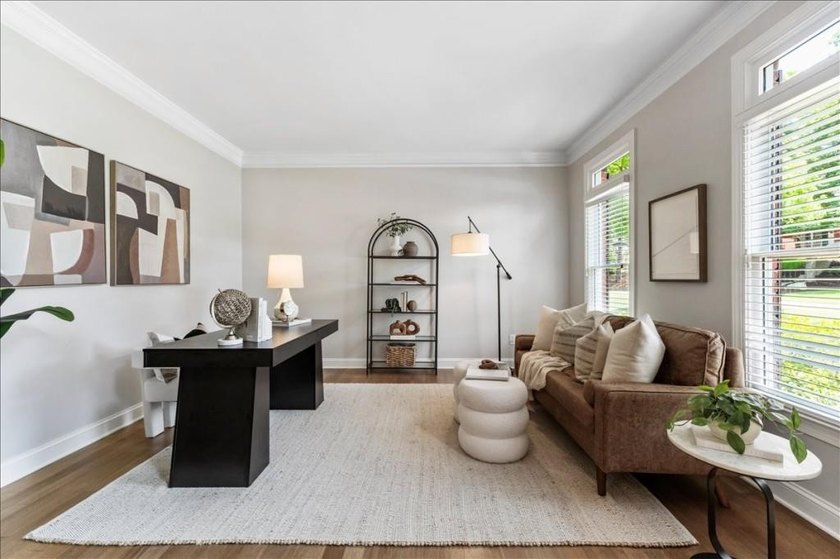 Welcome home to this stunning brick traditional nestled in the - photo 11