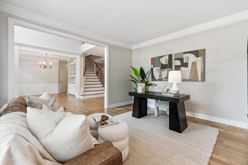 Welcome home to this stunning brick traditional nestled in the - photo 12