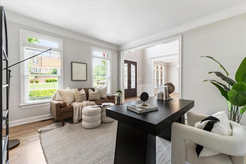 Welcome home to this stunning brick traditional nestled in the - photo 13