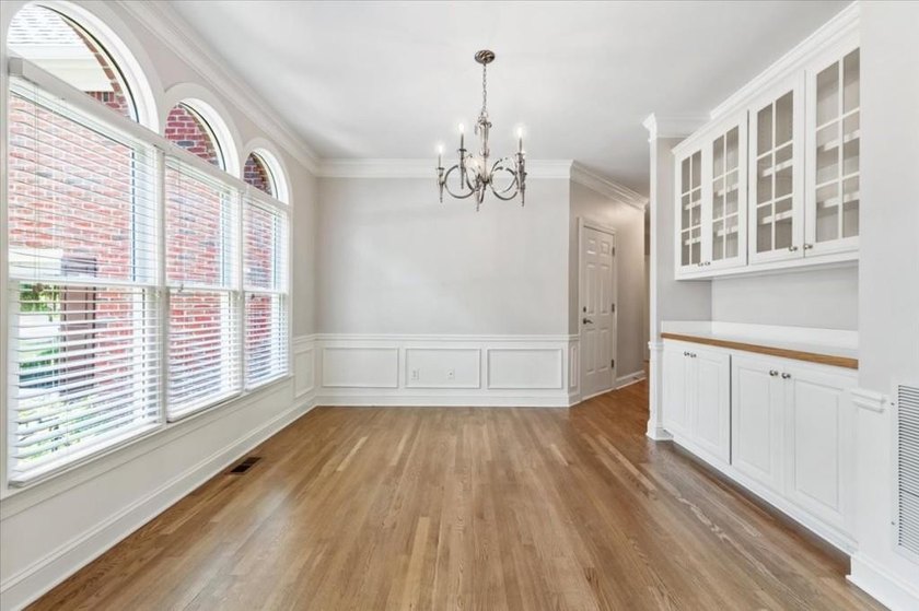 Welcome home to this stunning brick traditional nestled in the - photo 15