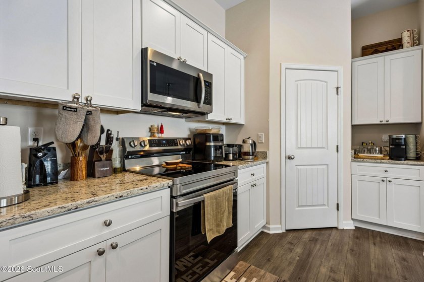 Built in 2023, beautifully maintained, and serving up pond views - photo 15