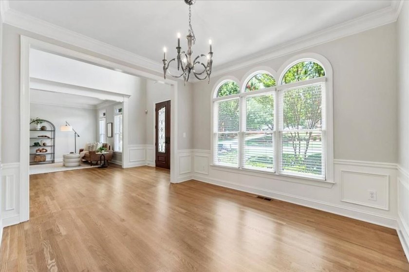 Welcome home to this stunning brick traditional nestled in the - photo 16