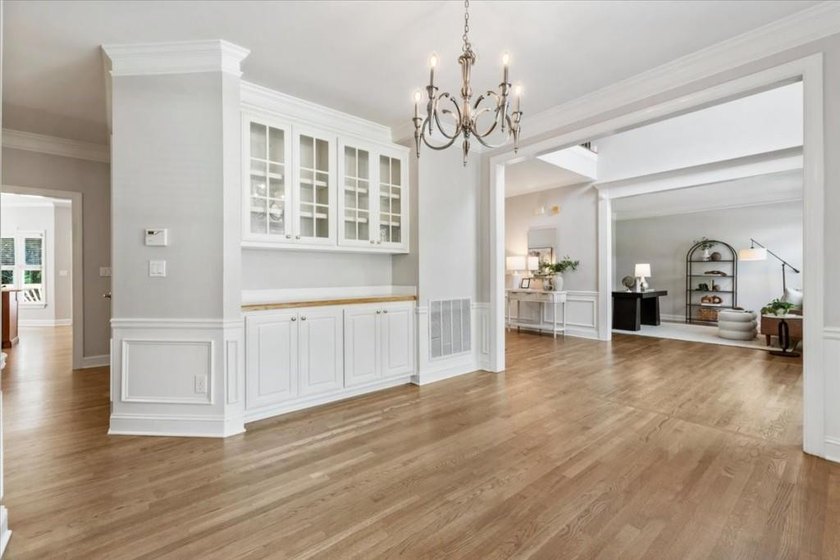 Welcome home to this stunning brick traditional nestled in the - photo 17