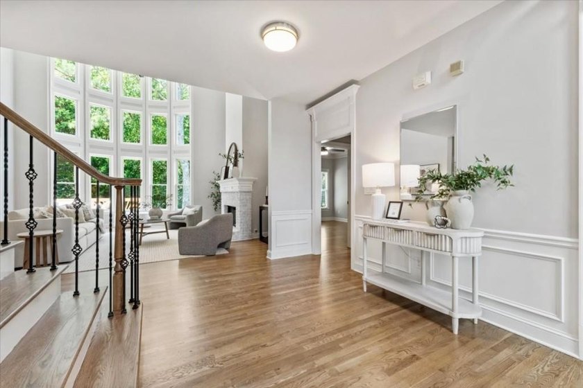 Welcome home to this stunning brick traditional nestled in the - photo 18
