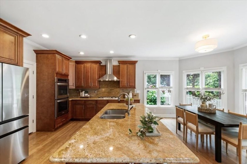 Welcome home to this stunning brick traditional nestled in the - photo 23