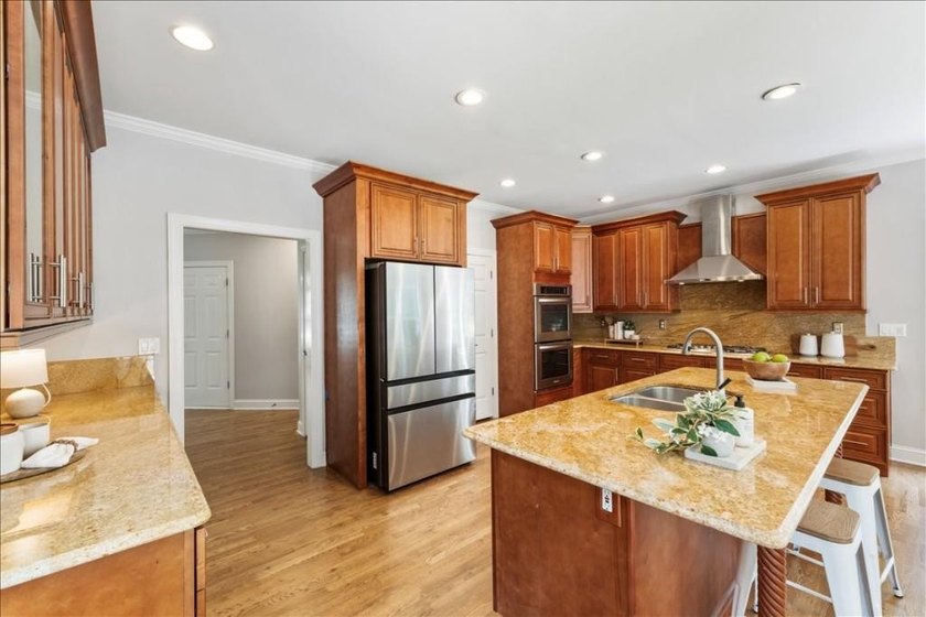 Welcome home to this stunning brick traditional nestled in the - photo 24