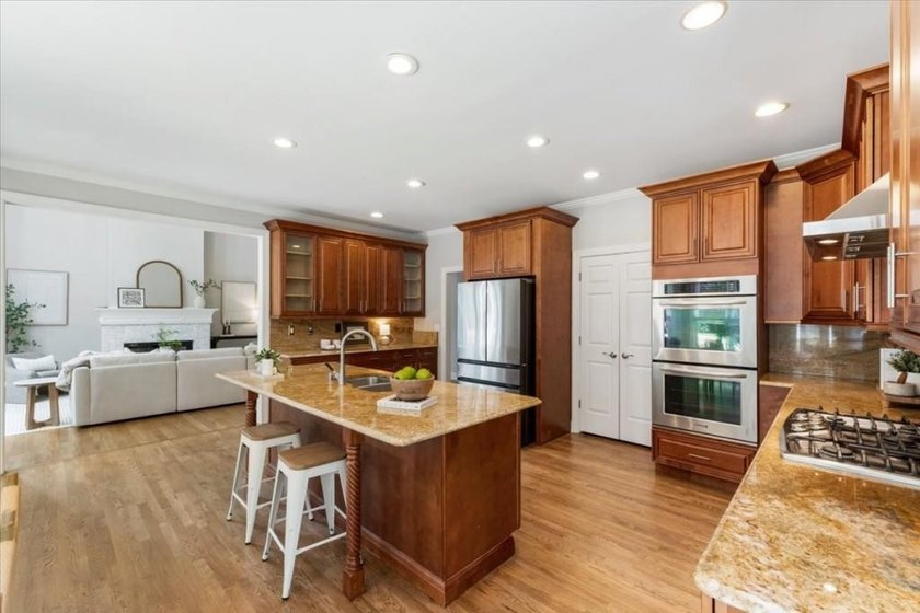 Welcome home to this stunning brick traditional nestled in the - photo 25