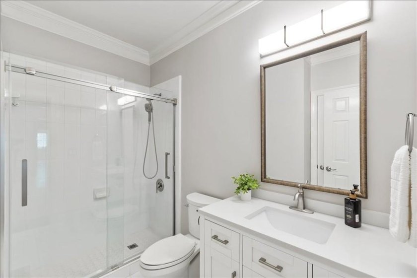 Welcome home to this stunning brick traditional nestled in the - photo 36