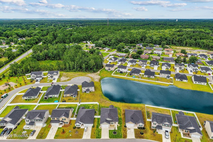 Built in 2023, beautifully maintained, and serving up pond views - photo 39