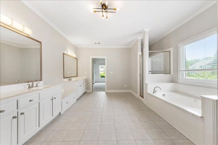 Welcome home to this stunning brick traditional nestled in the - photo 41