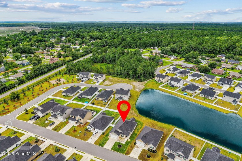 Built in 2023, beautifully maintained, and serving up pond views - photo 41