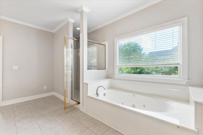 Welcome home to this stunning brick traditional nestled in the - photo 42