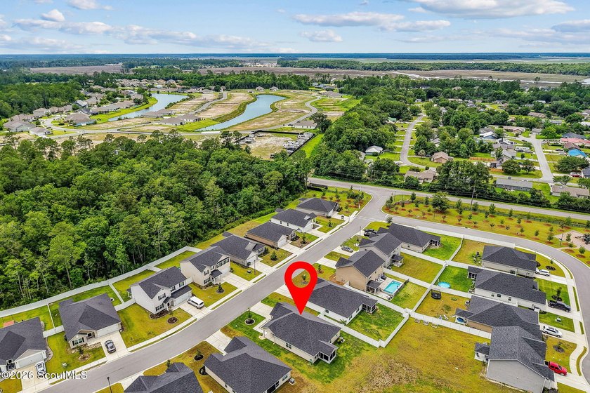 Built in 2023, beautifully maintained, and serving up pond views - photo 45