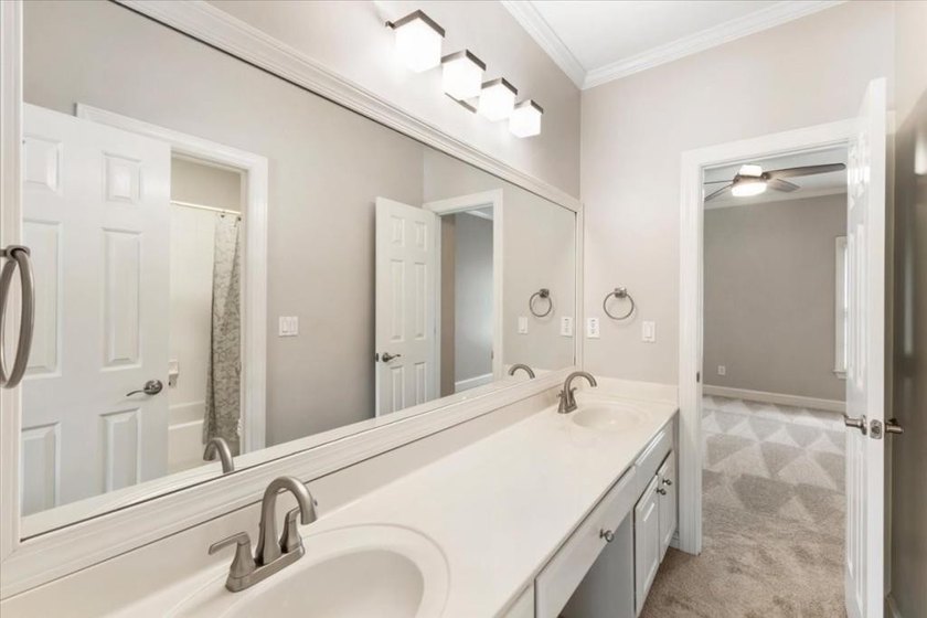 Welcome home to this stunning brick traditional nestled in the - photo 46