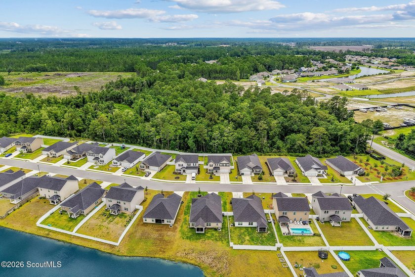 Built in 2023, beautifully maintained, and serving up pond views - photo 46