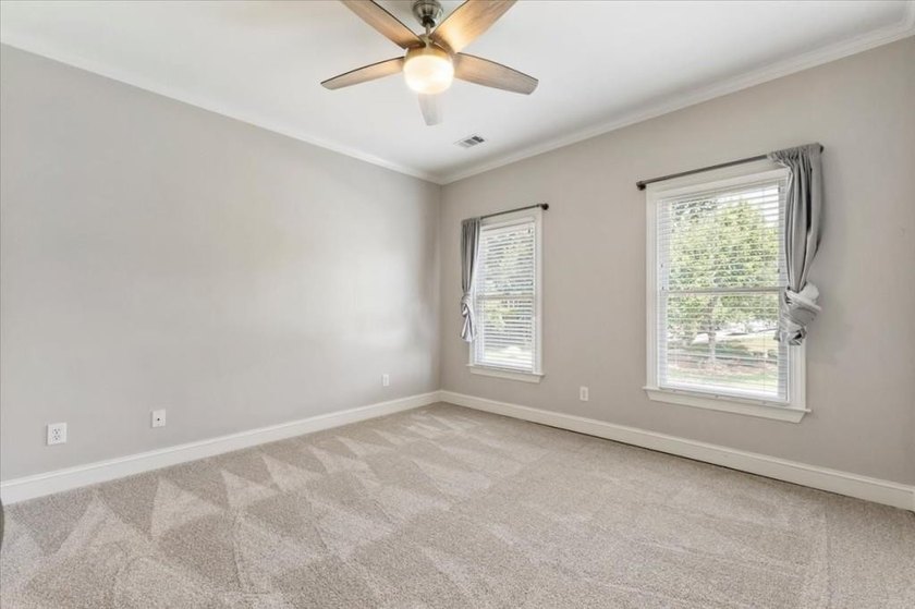 Welcome home to this stunning brick traditional nestled in the - photo 48