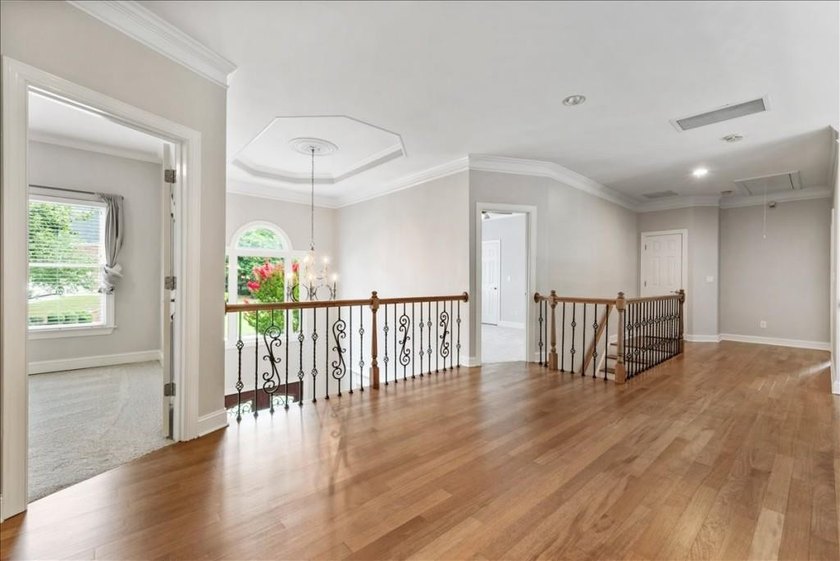 Welcome home to this stunning brick traditional nestled in the - photo 49