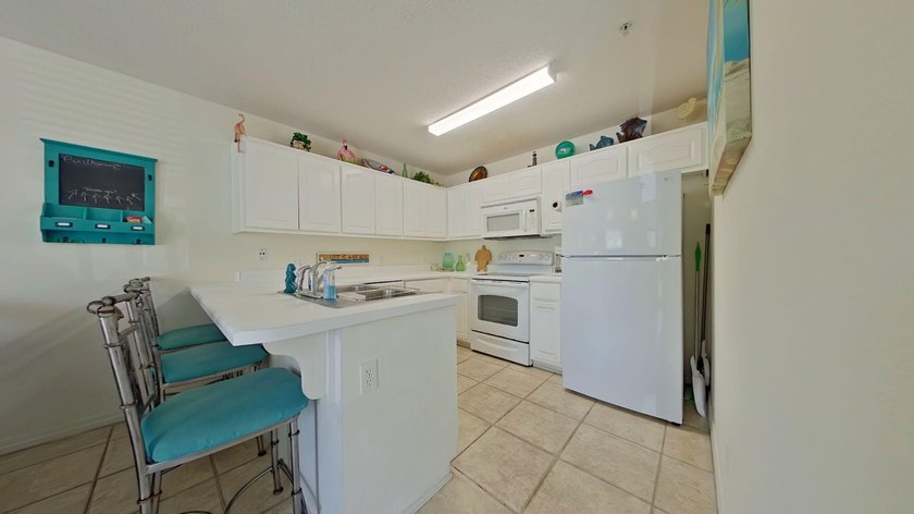 Priced $90,000 below comparable one-bedroom units in the complex - photo 9