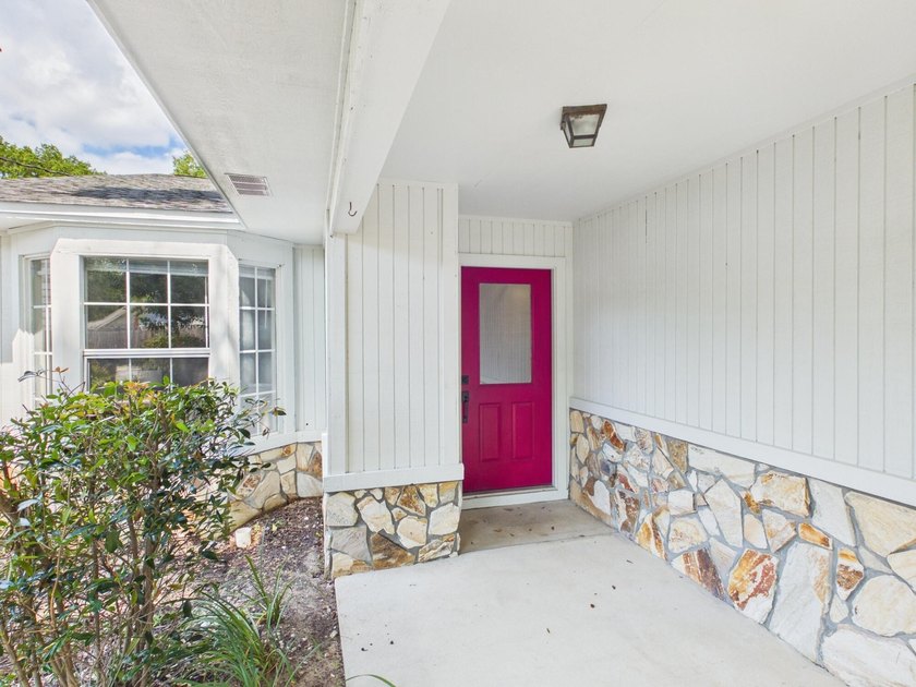 Move-in ready and loaded with updates, this beautifully - photo 2