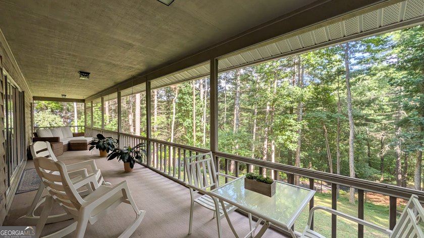 Welcome to 5302 Summerwood Lane, a very private home set high - photo 3