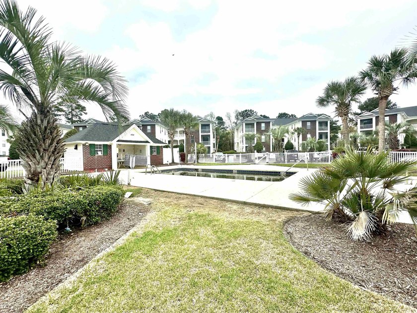 Welcome home to the River Oaks Condos located in desirable - photo 2