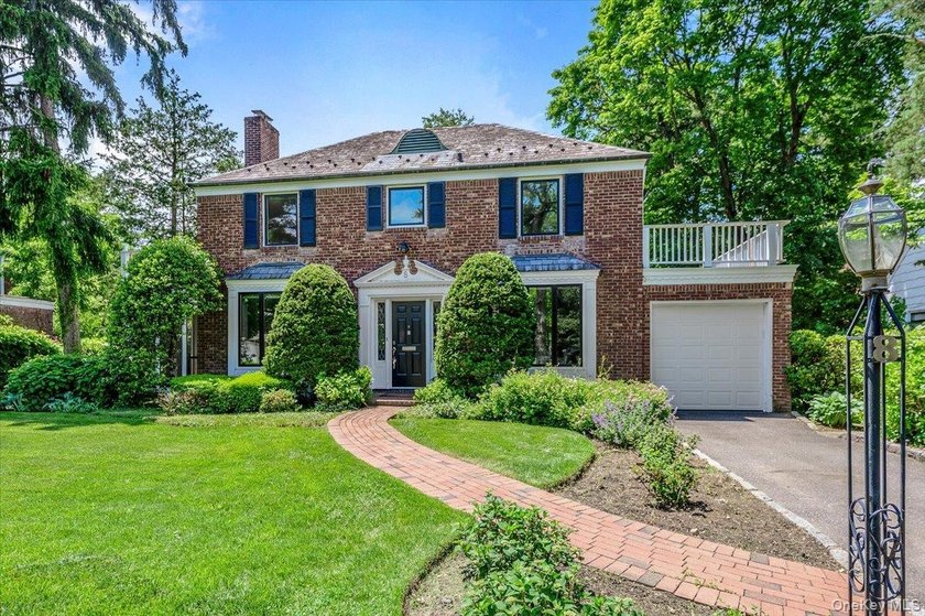 Welcome to this one-of-a-kind gem in the prestigious Village of - photo 3