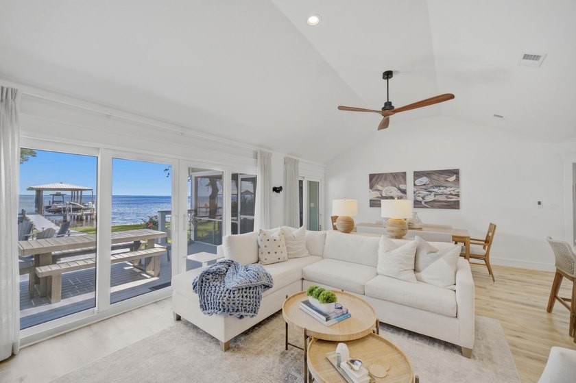 Beautifully remodeled coastal home featuring a private dock - photo 5
