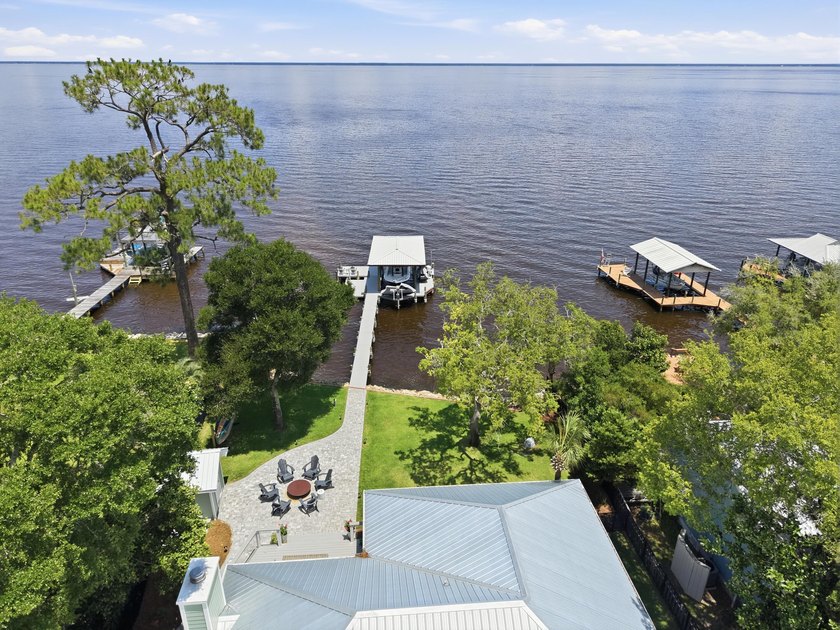 Beautifully remodeled coastal home featuring a private dock - photo 7