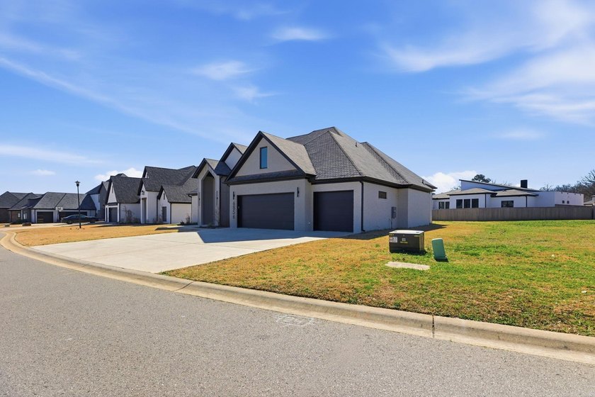 Located within a gated subdivision featuring a neighborhood pond - photo 3