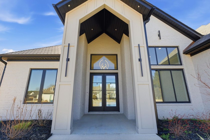 Located within a gated subdivision featuring a neighborhood pond - photo 5