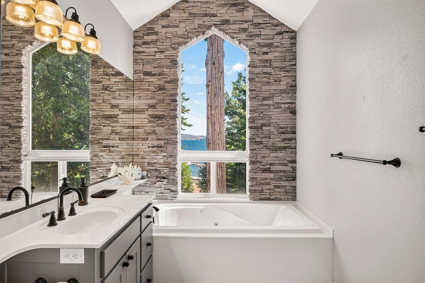 Experience mountain-lake living at its finest in this - photo 32