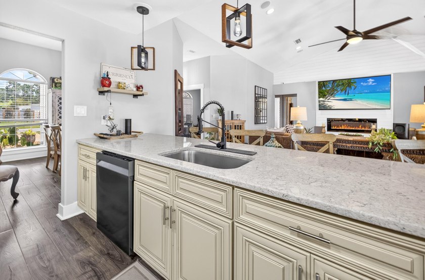 Nestled on a .54 acre corner cul-de-sac lot in the gated - photo 9
