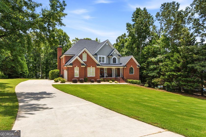 Welcome to this exceptional, one-owner lakefront home, offered - photo 3