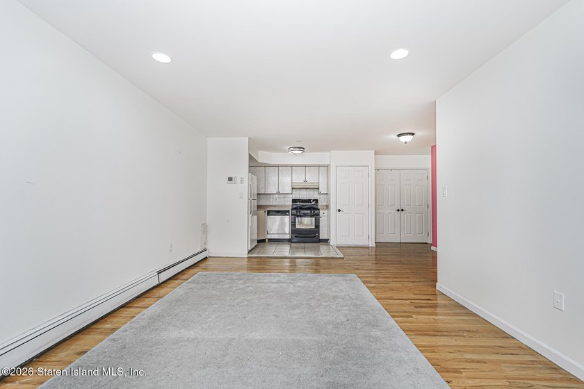 Welcome to this well-maintained 2-bedroom, 1.5-bath condo in the - photo 17