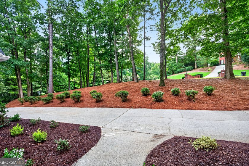 Welcome to 1001 Mickleton Lane, a timeless custom residence - photo 9