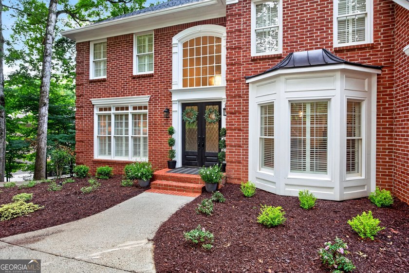 Welcome to 1001 Mickleton Lane, a timeless custom residence - photo 10