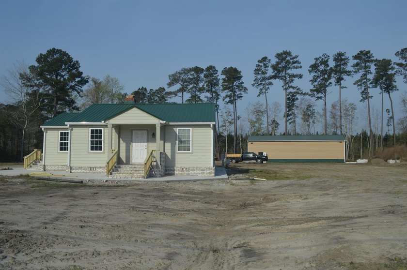 This home has been completely above and beyond remodeled - photo 2