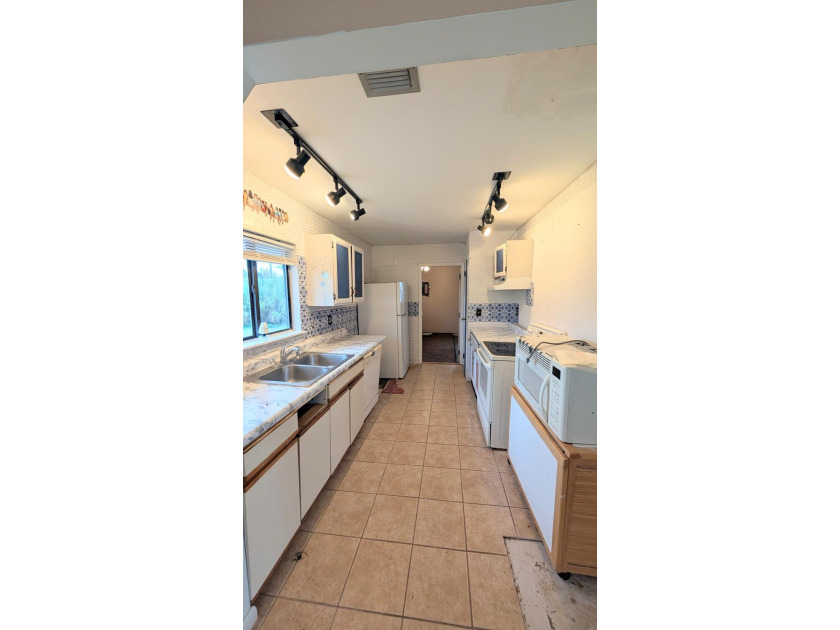 Opportunity awaits in this 3-bedroom, 2-bath home located in the - photo 13
