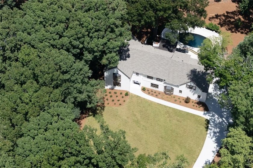 Masterfully renovated and expanded by Hudgins Property Group - photo 3