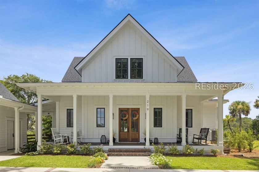Step into a truly exceptional marshfront retreat where modern - photo 3