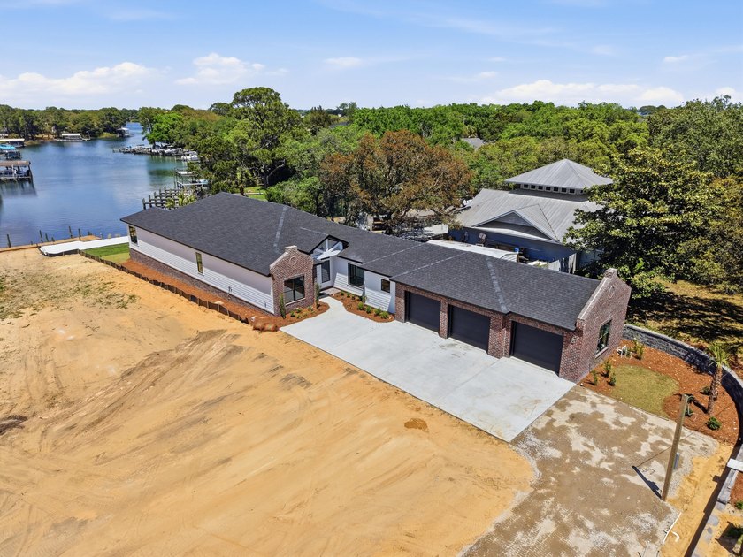 Luxury Waterfront Living with Private Dock &amp; Boat Slip! - photo 3