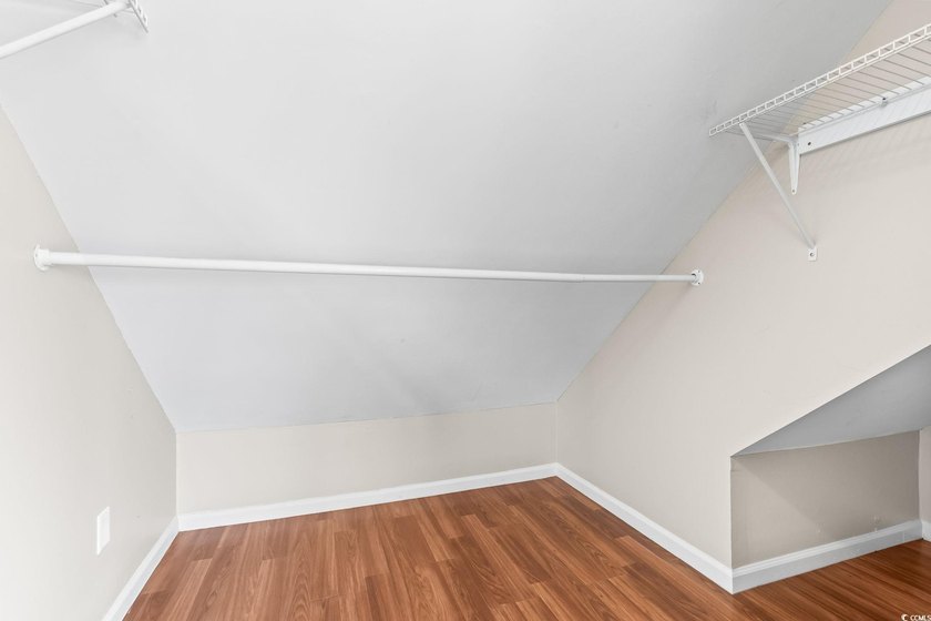 This charming three-bedroom, two-bathroom patio home is located - photo 24