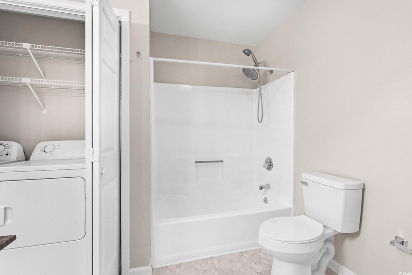 This charming three-bedroom, two-bathroom patio home is located - photo 29