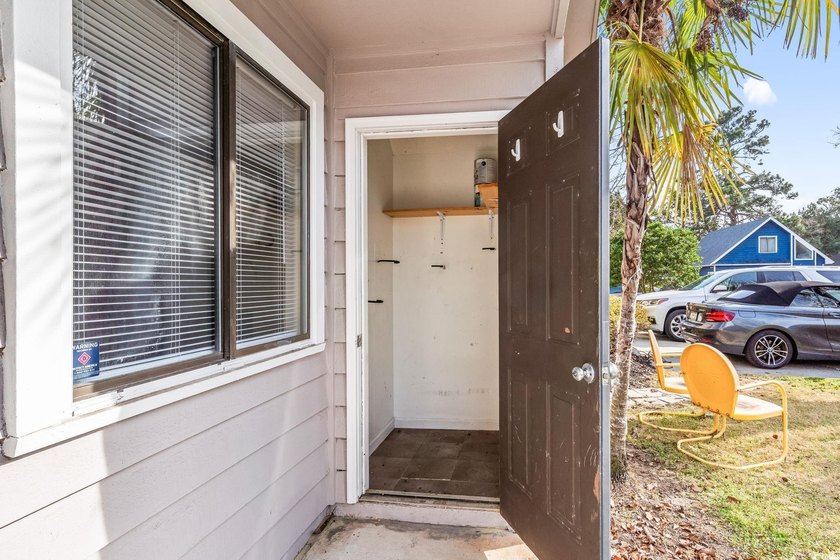 This charming three-bedroom, two-bathroom patio home is located - photo 32