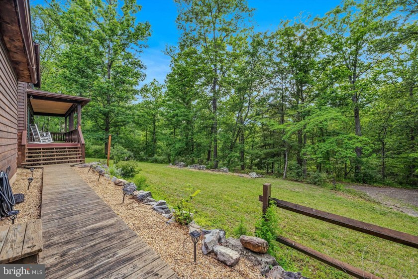 This custom Cape Cod offers approximately 2,600 square feet set - photo 4