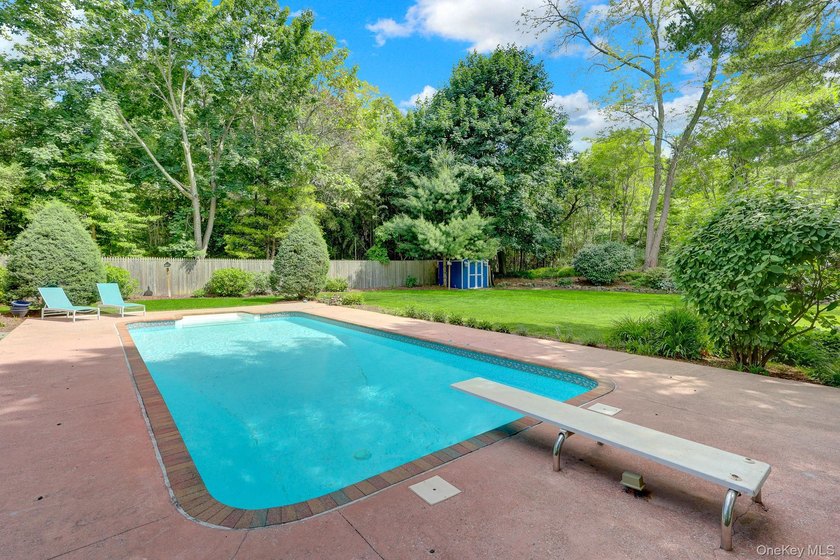 Three Village at its finest! This stately center hall colonial - photo 4