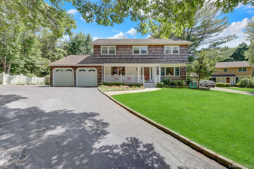 Three Village at its finest! This stately center hall colonial - photo 6