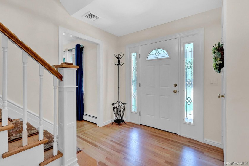 Three Village at its finest! This stately center hall colonial - photo 8