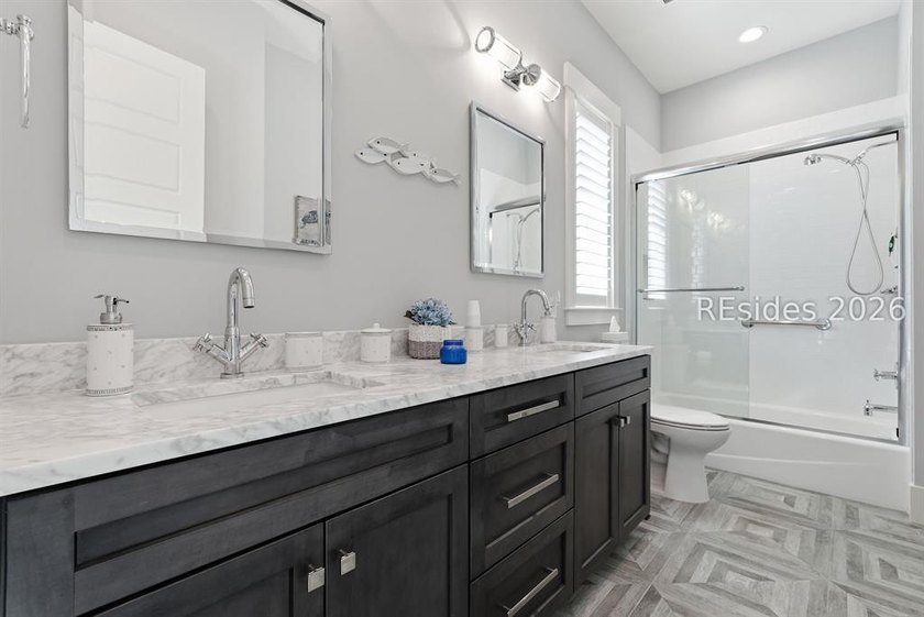 Custom-built by Shoreline Construction in 2018, this beautifully - photo 27